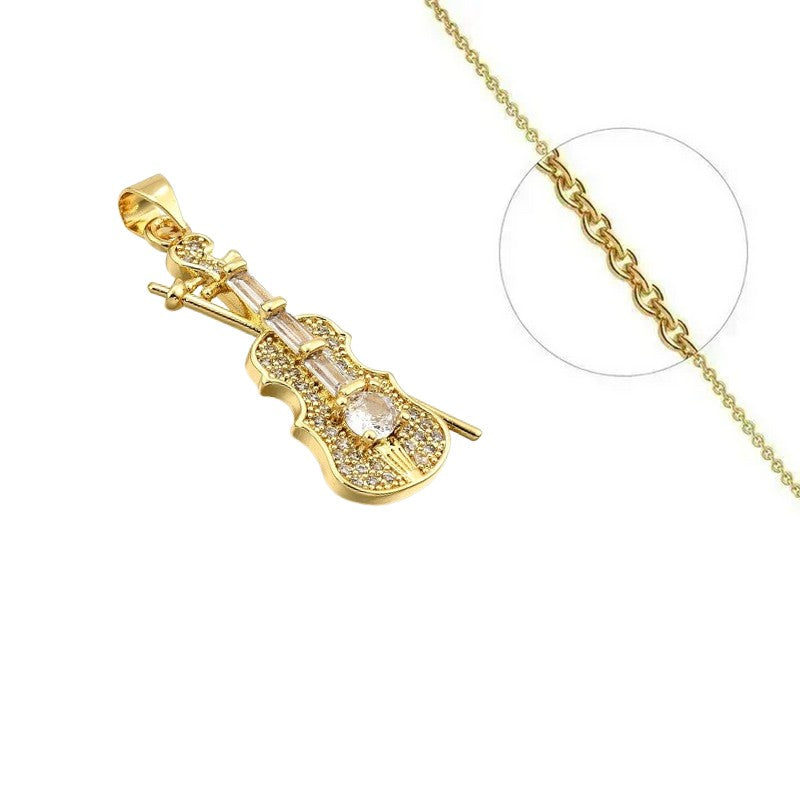 Collier doré chaîne et pendentif magnifique violon zirconiums blanc sertis