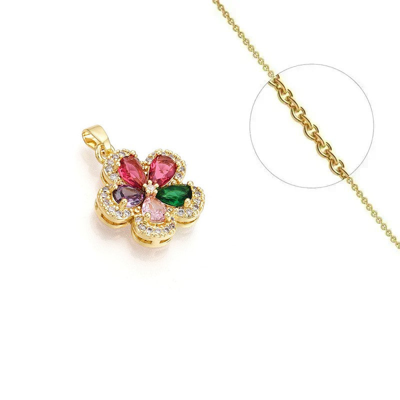 Collier doré chaîne et pendentif fleur zirconiums couleurs sertis
