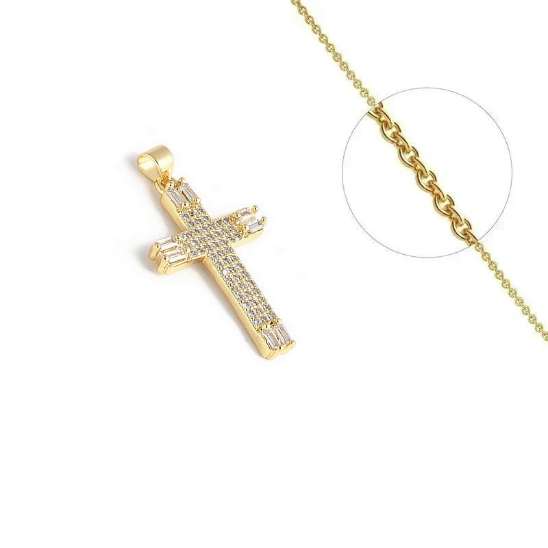 Collier doré chaîne et pendentif croix zirconiums sertis