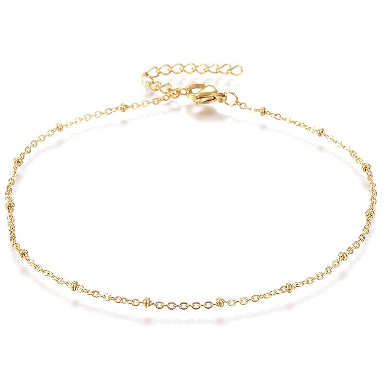 Chaîne de cheville fine acier inoxydable doré avec perles rondes
