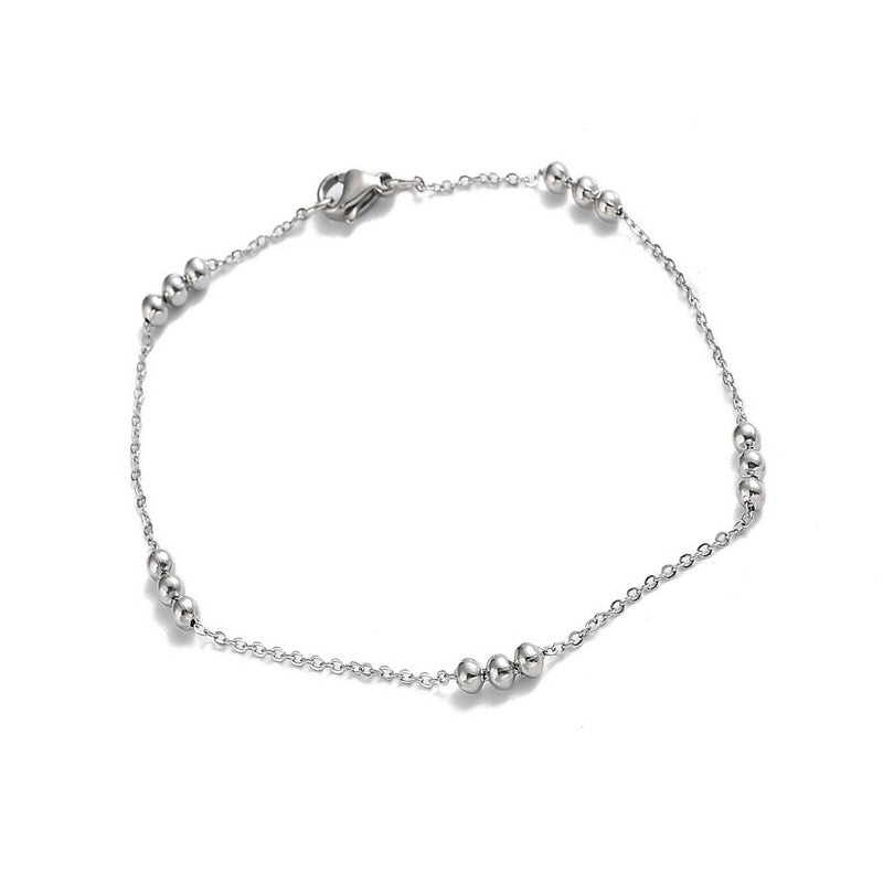 Bracelet fin acier inoxydable orné de boules délicates