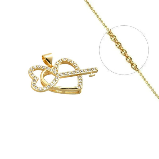 Collier doré chaîne et pendentif clé cœur orné de zirconiums sertis