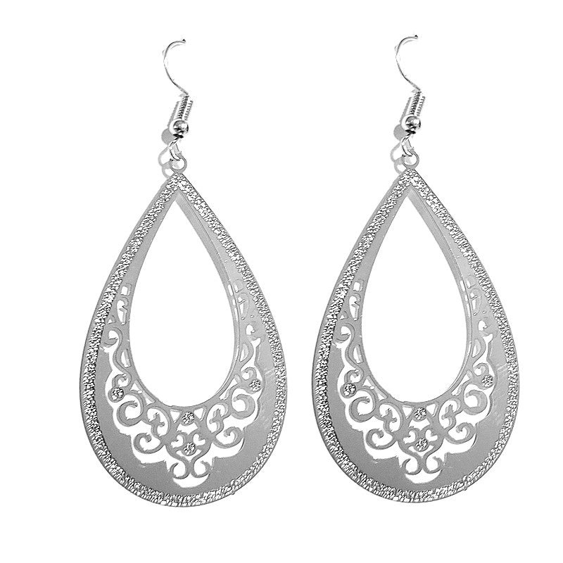 Boucles d'oreilles fantaisie tombante ovale filigrane argenté