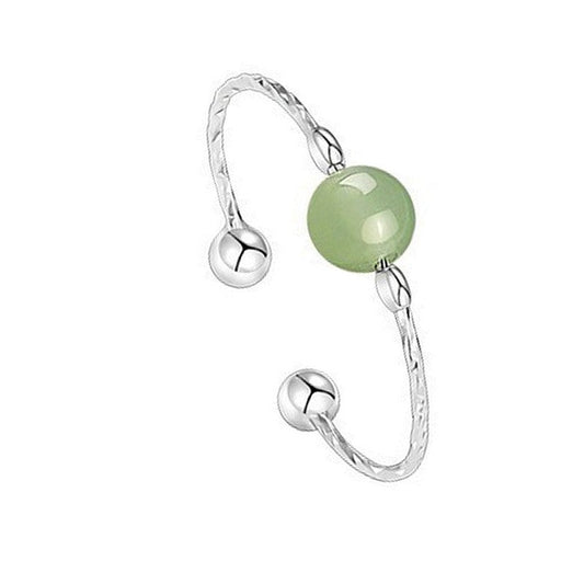 Très jolie bague en argent 925 boule en pierre de jade