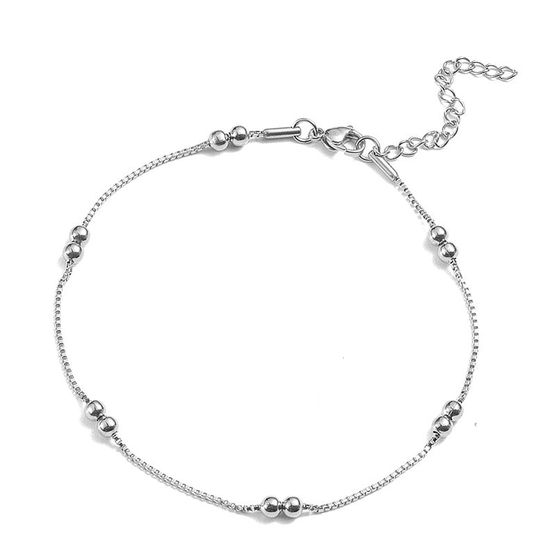 Chaîne de cheville acier inoxydable argenté avec perles rondes