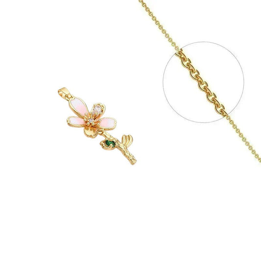 Collier doré chaîne et pendentif fleur nacre zirconiums sertis