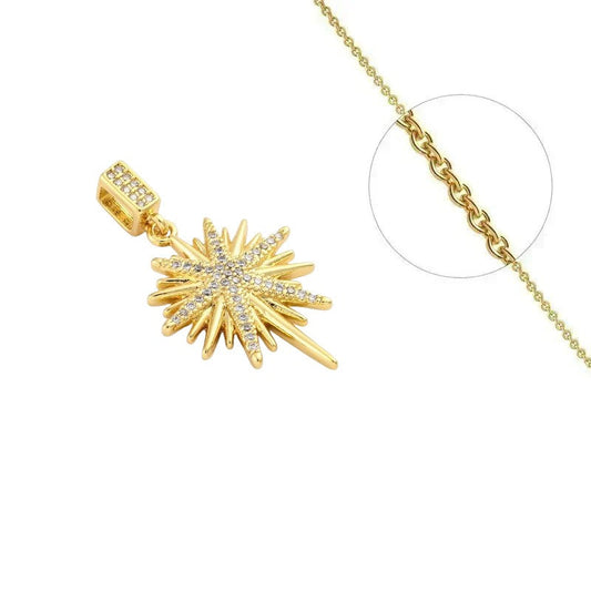 Collier doré chaîne et pendentif étoile du nord orné de zirconiums sertis
