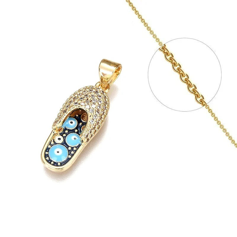 Collier chaîne et son pendentif tong avec œil oriental serti de zirconiums