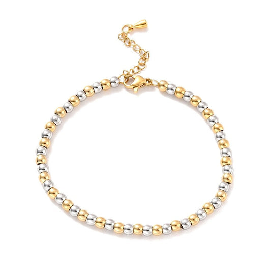 Bracelet acier inoxydable bicolore billes or et acier