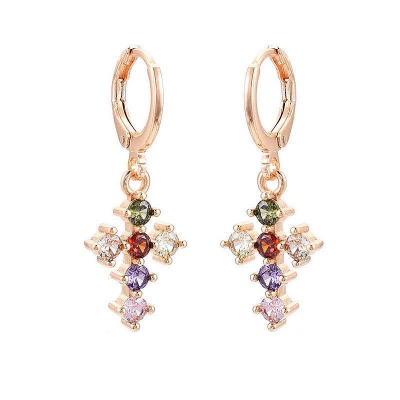 Boucles d'oreilles croix zirconiums couleurs sertis or rose