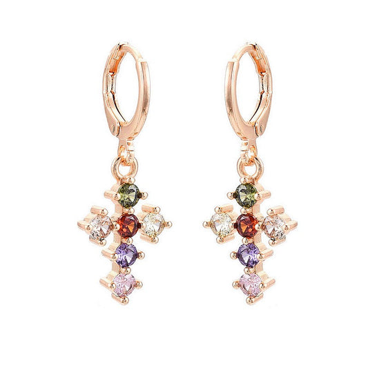 Boucles d'oreilles croix zirconiums couleurs sertis or rose